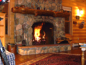  The builder hand-picked the Arkansas River stones for this cozy fireplace.